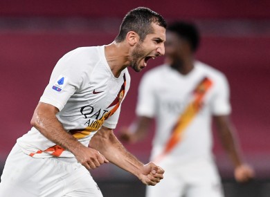 Henrikh Mkhitaryan celebrates scoring a goal for Roma.