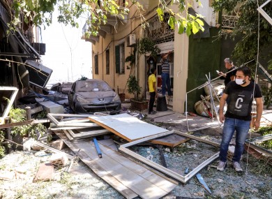 Locals survey the damage in downtown Beirut.