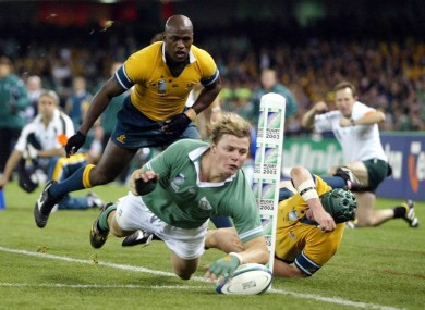 Brian O'Driscoll goes over to score Ireland's try in their 16-15 defeat by Australia at the 2003 tournament in Melbourne.
