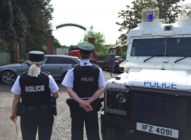 Police and army bomb disposal experts at Shandon Park Golf Club in east Belfast to examine a suspect device under a car in the car park in June 2019.