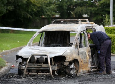 One of the burnt-out vehicles near the scene in September 2019.