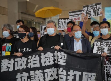 Hong Kong pro-democracy activists speaking to media outside court today.