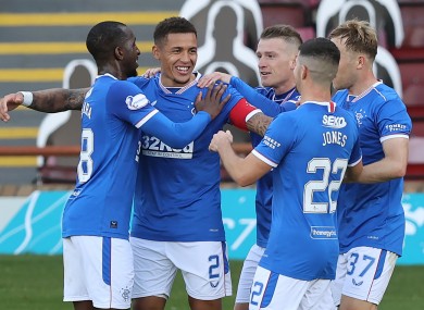 Rangers' James Tavernier (centre left) celebrates with his team-mates after scoring his side's second goal of the game from the penalty spot.