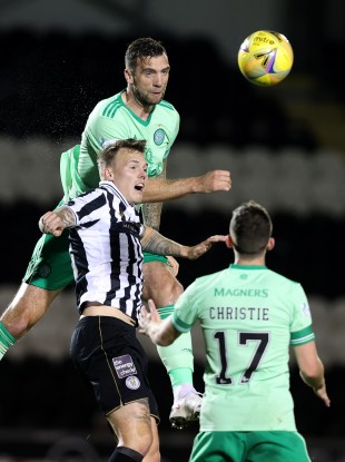 Celtic's Shane Duffy and St Mirren's Lee Erwin battle for the ball.
