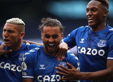 Calvert-Lewin celebrates his goal with Richarlison (left) and Yerry Mina (right.)