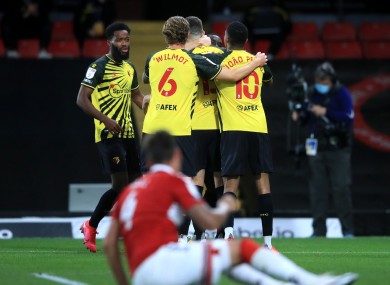 Watford celebrate Craig Cathcart's goal.