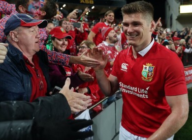 Kicking on: Owen Farrell in Lions' red.