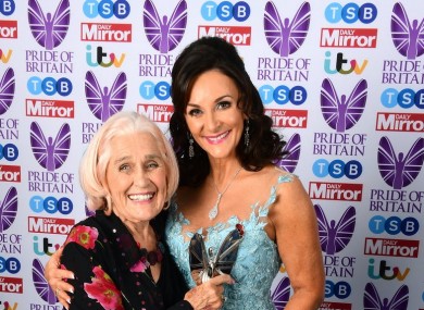 Dilys Price (left) being presented with a Pride of Britain award in 2017