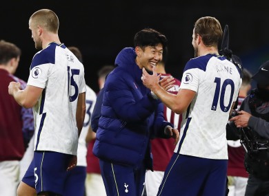 Son Heung-Min and Harry Kane celebrate after the game.