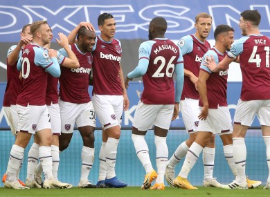 Michail Antonio celebrates with his West Ham team-mates after opening the scoring.