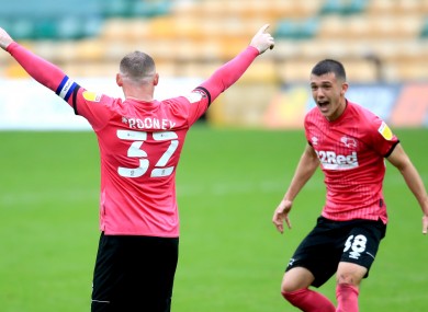 Derby County's Wayne Rooney (left) celebrates with teammate Jason Knight.