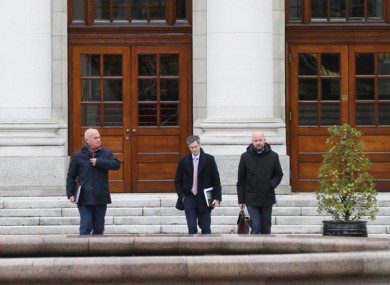 Tony Holohan, Ronan Glynn and Philip Nolan leaving Government Buildings yesterday.