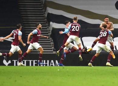 West Ham players celebrate their late equaliser.