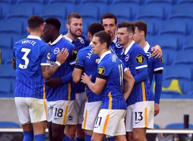 Brighton and Hove Albion's Pascal Gross (right) celebrates scoring.