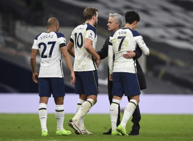 Jose Mourinho embraces Harry Kane, Heung-min Son and Lucas Moura after the win over Man City.