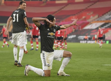 Edinson Cavani celebrates scoring yesterday.