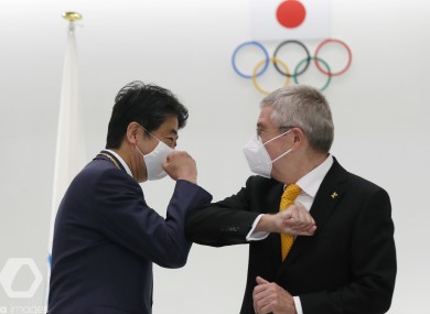 Former Japan's Prime Minister Shinzo Abe and Thomas Bach, President of the International Olympic Committee in Tokyo today.