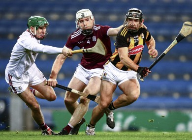Kilkenny's Richie Hogan in action against Galway's Eanna Murphy and Shane Cooney.