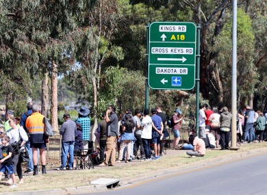 People are seen queuing at the Covid-19 testing site at Parafield Airport in Adelaide