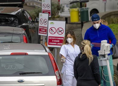 Doctors treating outside at the Cotugno Hospital in Campania.
