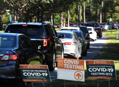 Card queuing at a rapid Covid-19 testing site in the US last month.