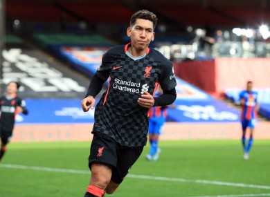 Roberto Firmino celebrates a goal.