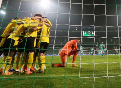 Dortmund celebrate Reus' winner.