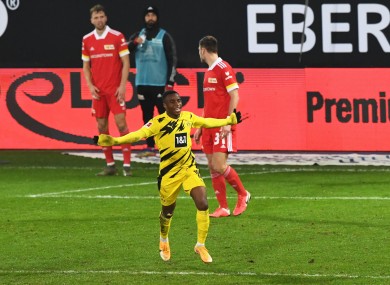 Youssoufa Moukoko celebrates scoring.