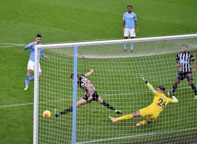 Ferran Torres scores City's second goal.