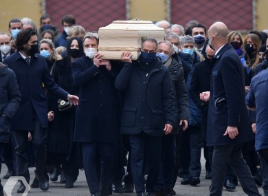 Former Ireland assistant manager Marco Tardelli and teammates from the 1982 World Cup-winning Italy side carry the coffin of Paolo Rossi yesterday.