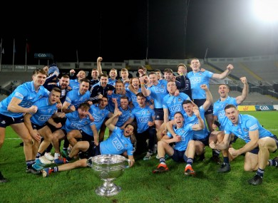The Dublin team celebrate with the Sam Maguire.