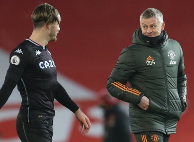 Jack Grealish chats to the United boss.