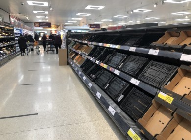 Depleted shelves in Sainsburys at the Forestside shopping centre in Belfast yesterday.