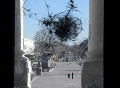 A Congress windows a day after pro Trump rioters stormed Capitol Hill last week.