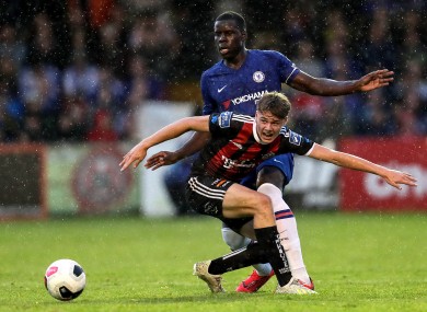 Ferguson battles with Chelsea's Kurt Zouma in a pre-season friendly in July 2019.