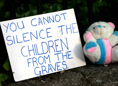 A sign and a teddy bear outside Leinster House in 2014 during a protest over the burial of babies at an institution in Tuam.