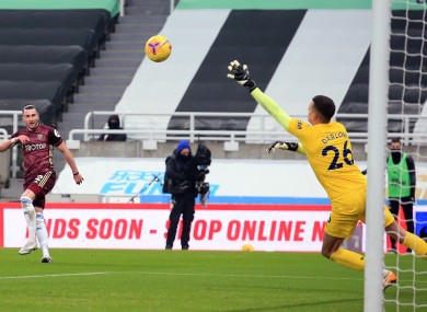 Leeds United's Jack Harrison scores his side's winning goal.