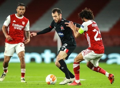 Stefan Colovic of Dundalk under pressure from Arsenal's Mohamed Elneny during last October's Europa League fixture.