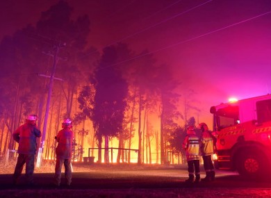 Firefighters at the scene of the wildfire today
