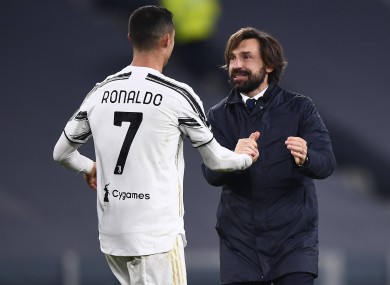 Cristiano Ronaldo and manager Andrea Pirlo celebrate.