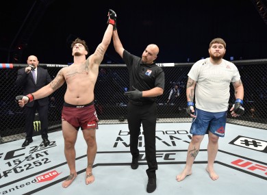 Aspinnal (left) celebrates.