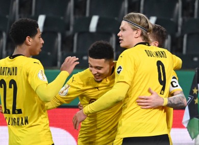 Jadon Sancho celebrates with his Borussia Dortmund team-mates.
