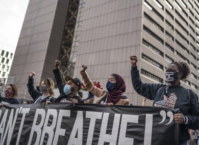 Demonstrators marched in Minneapolis on Sunday, one day before jury selection begins.
