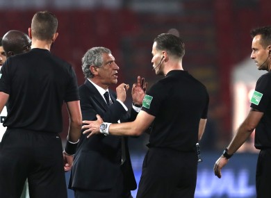 Portugal's head coach Fernando Santos argues with referee Danny Makkeli.
