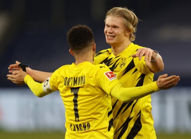 Jadon Sancho celebartes with Erling Haaland (file photo).