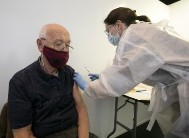Kenneth Rundle getting his first dose of the Pfizer Vaccine from Doctor Elizabeth Walsh from Lusk Medical in the Helix Vaccination Centre.