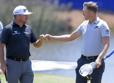 Graeme McDowell (left) in action in the Zurich Classic on Friday.