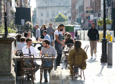 People dining outdoors in Dublin last September.