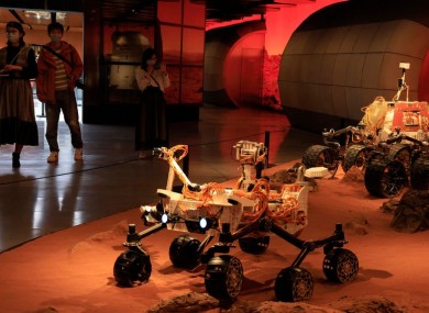 China, which hosts this depiction of a Chinese lander in a Mars-like environment in Beijing, recently brought lunar samples back to Earth