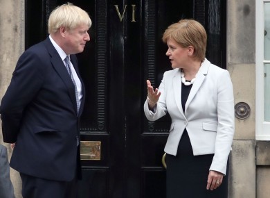 Scotland's First Minister Nicola Sturgeon and UK Prime Minister Boris Johnson outside Bute House in Edinburgh.